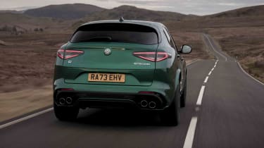 Alfa Romeo Stelvio Quadrifoglio - rear tracking with long road ahead